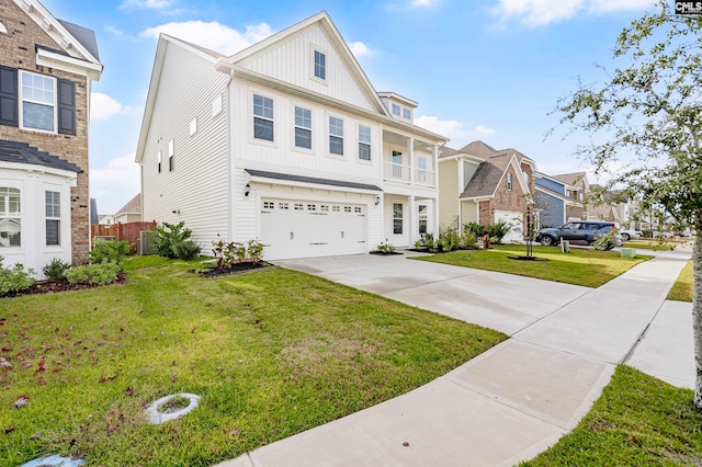 view of front of house with a front yard and a garage