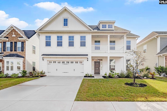 view of front of home featuring a balcony, a garage, and a front lawn