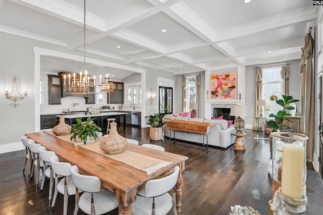 dining area featuring beamed ceiling, dark hardwood / wood-style floors, and coffered ceiling