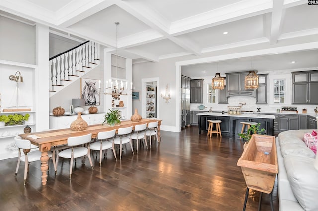 dining area with dark hardwood / wood-style flooring, beamed ceiling, and coffered ceiling