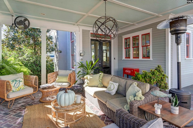 sunroom featuring a wood stove