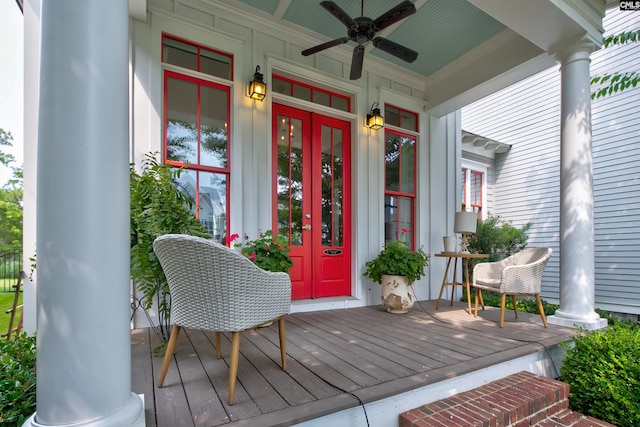 doorway to property with ceiling fan and covered porch