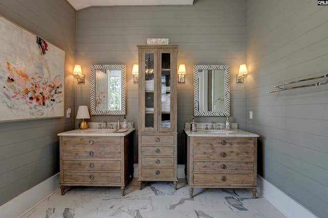 bathroom with wooden walls and vanity