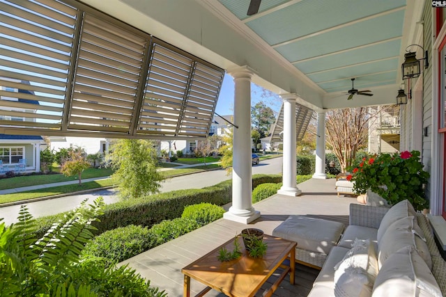 view of patio with a porch and ceiling fan