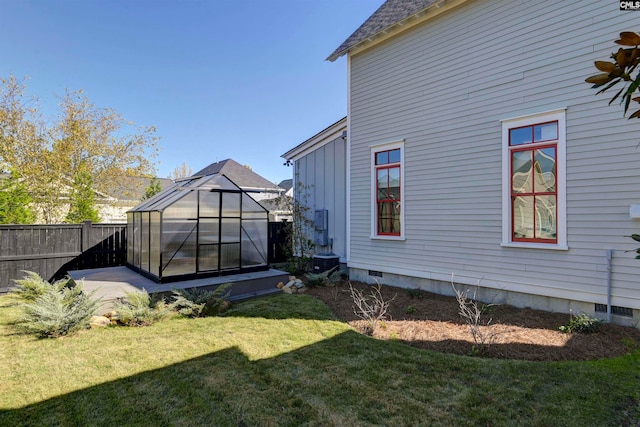 exterior space with a yard and an outdoor structure