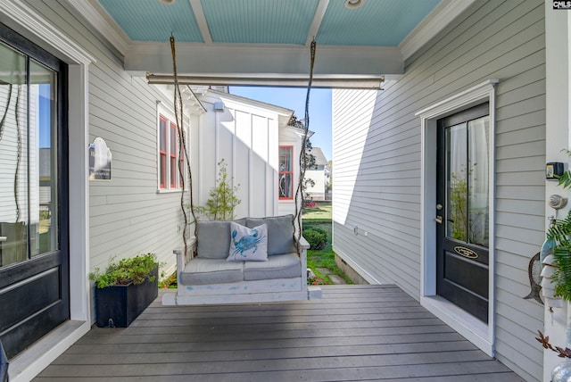 deck with covered porch