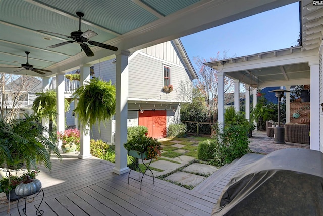 wooden deck with ceiling fan