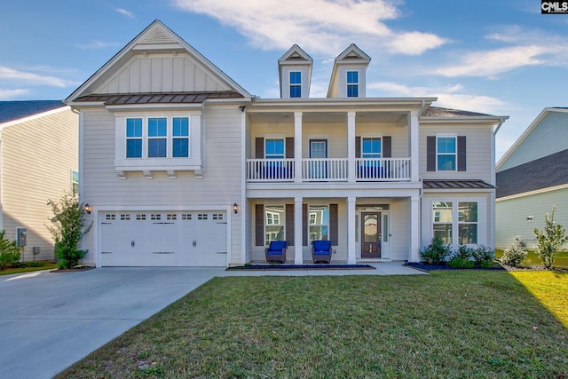 view of front of property featuring covered porch, a garage, a balcony, and a front yard