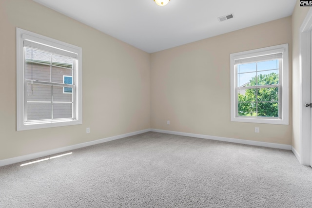 unfurnished room featuring carpet floors