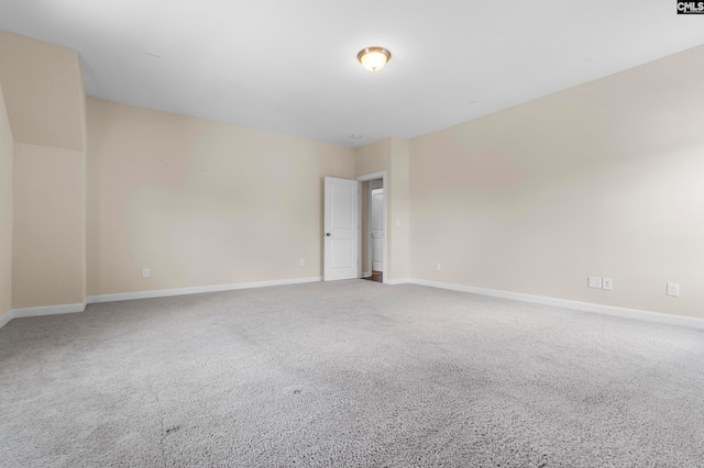 unfurnished room with carpet flooring