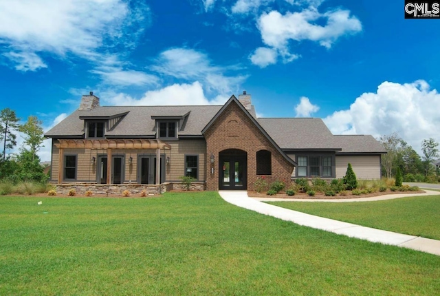 view of front facade featuring a pergola, french doors, and a front lawn