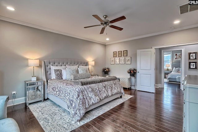 bedroom featuring ceiling fan, ornamental molding, and dark wood-type flooring