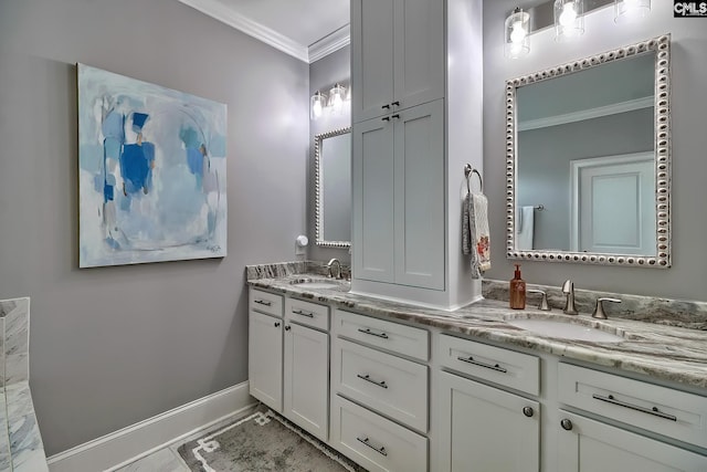 bathroom with vanity and crown molding