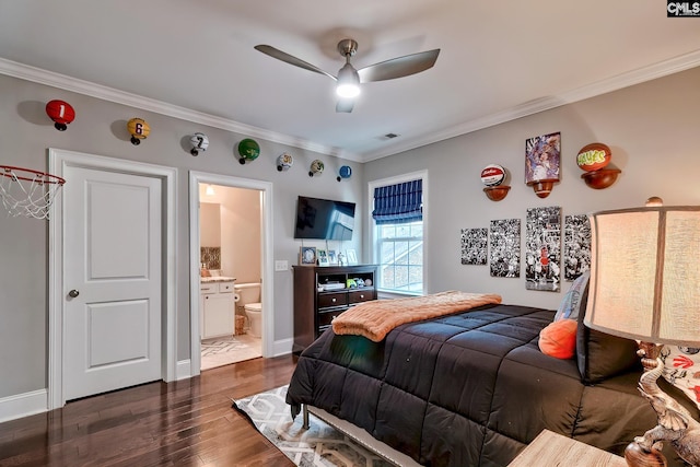 bedroom featuring ceiling fan, crown molding, dark wood-type flooring, and connected bathroom