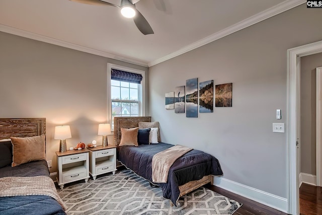 bedroom featuring ceiling fan, dark hardwood / wood-style flooring, and ornamental molding