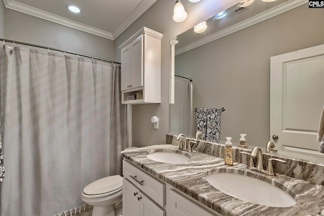 bathroom featuring vanity, toilet, and crown molding