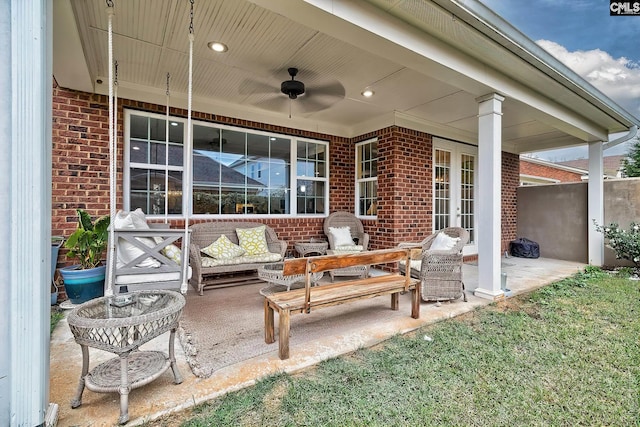 view of patio with ceiling fan