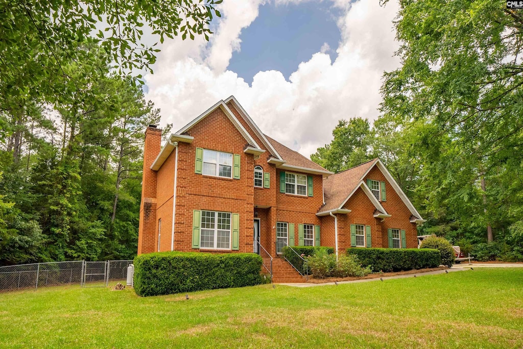 view of front of home with a front lawn