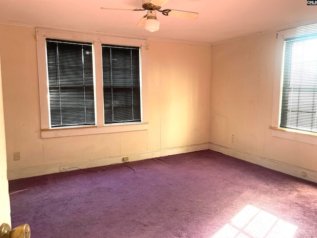 spare room with carpet flooring and ceiling fan