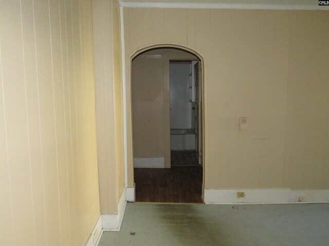 406 Pine St, Darlington, SC 29532 - spare room with arched walkways, baseboards, and wood finished floors