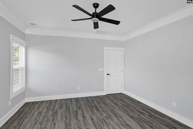 unfurnished room featuring crown molding, ceiling fan, and dark wood-type flooring