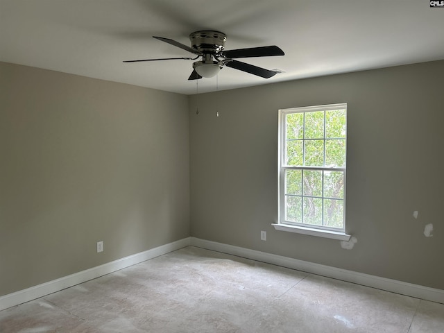 2107 Durham Dr, West Columbia, SC 29170 - spare room with a ceiling fan and concrete floors