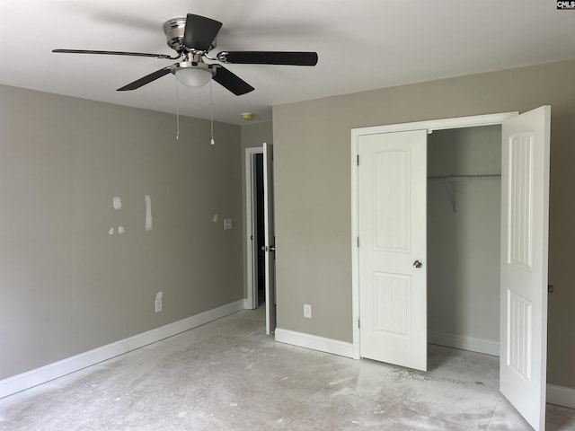 2107 Durham Dr, West Columbia, SC 29170 - unfurnished bedroom with concrete floors, a closet, and a ceiling fan