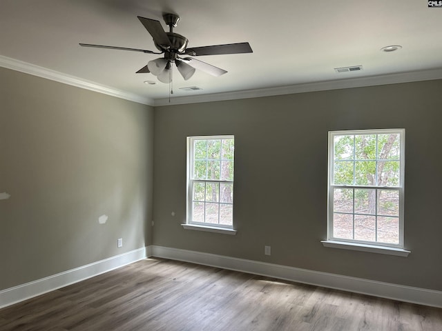 2107 Durham Dr, West Columbia, SC 29170 - empty room with ornamental molding, wood finished floors, ceiling fan, and recessed lighting
