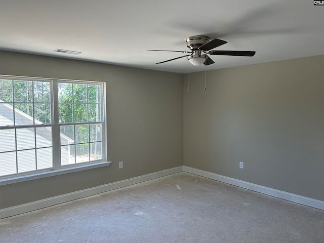 spare room with ceiling fan