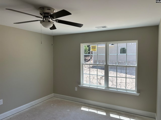 empty room featuring ceiling fan