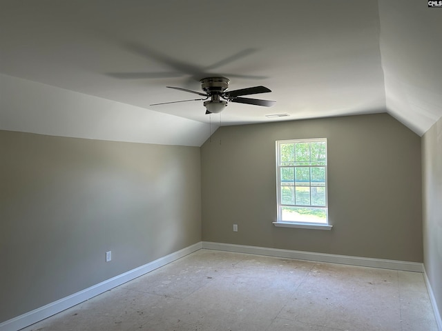 additional living space featuring ceiling fan and lofted ceiling