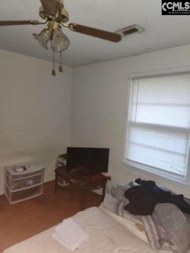 bedroom featuring ceiling fan