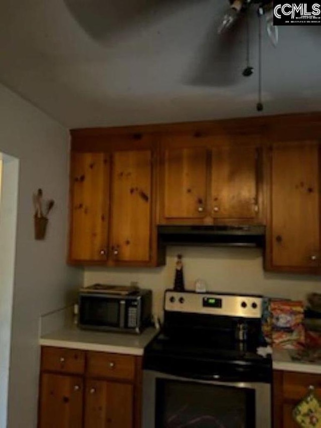 kitchen with stainless steel electric range oven