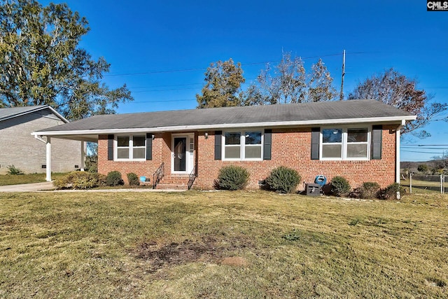 ranch-style home with a front yard