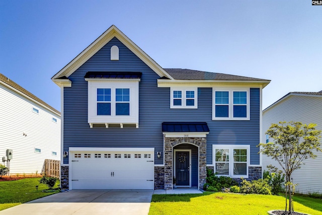 view of front facade featuring a front yard and a garage