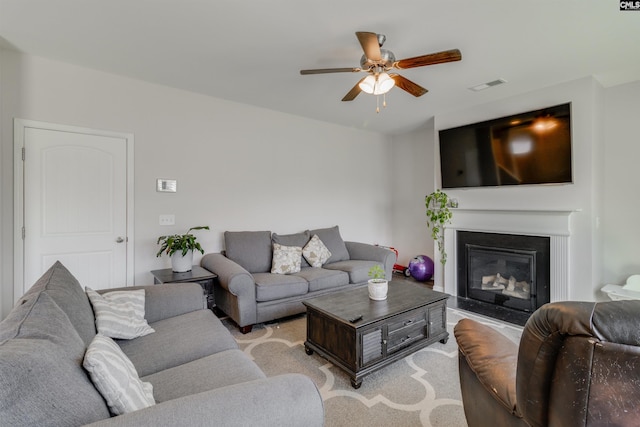 living room with ceiling fan