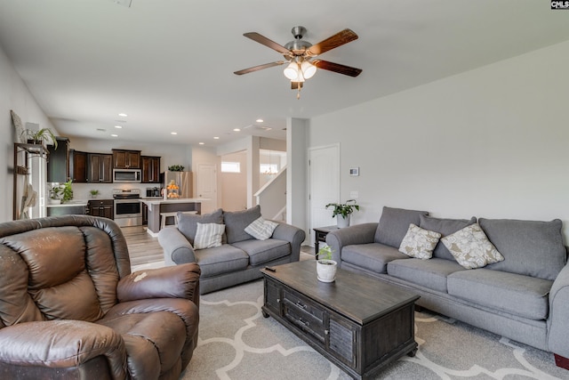 living room with ceiling fan