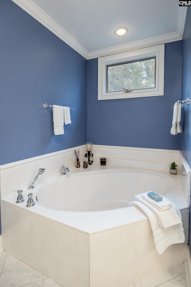 bathroom with crown molding and a tub to relax in