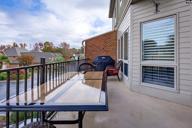 balcony featuring area for grilling