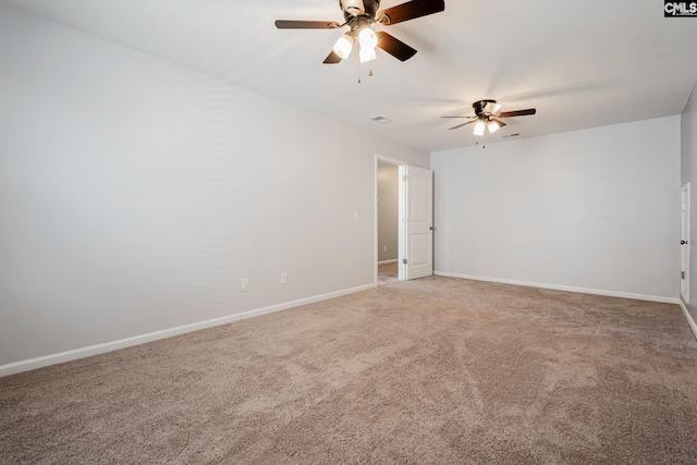 empty room featuring carpet and ceiling fan