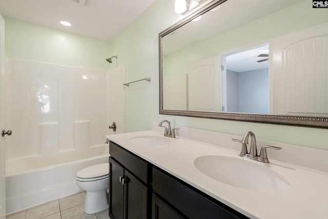 full bathroom featuring tile patterned flooring, vanity,  shower combination, and toilet