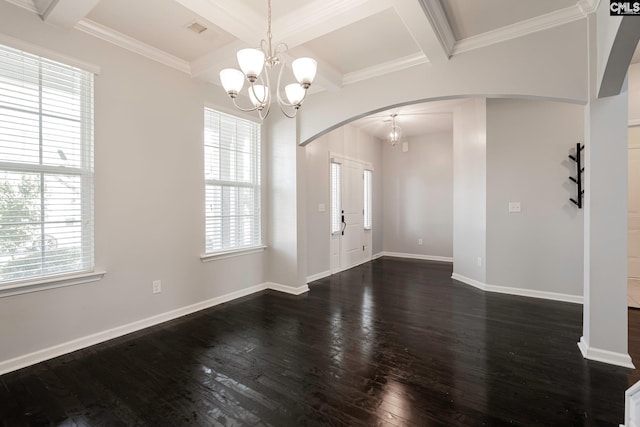 interior space with coffered ceiling, an inviting chandelier, dark hardwood / wood-style flooring, beamed ceiling, and ornamental molding