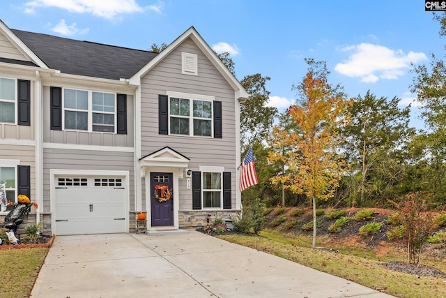 view of front of home with a garage