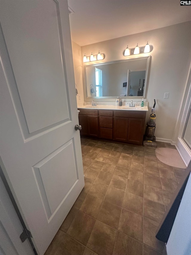 bathroom featuring vanity and tile patterned floors