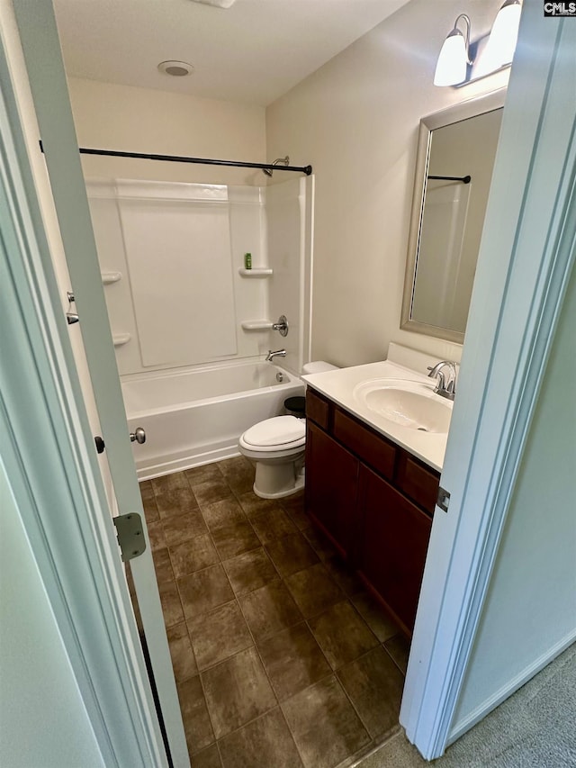 full bathroom featuring vanity, washtub / shower combination, and toilet