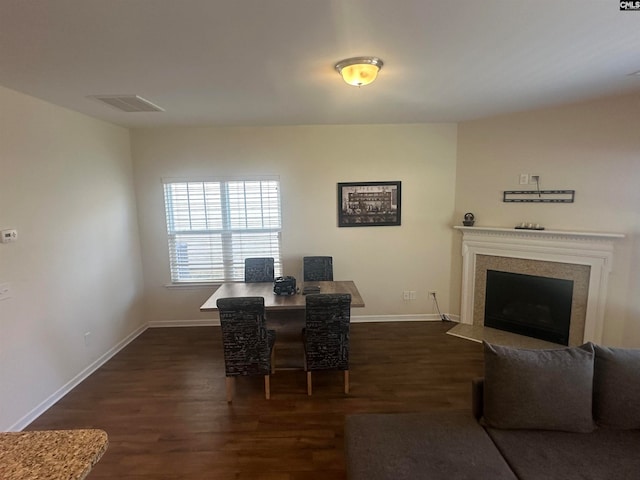 dining room featuring dark hardwood / wood-style flooring