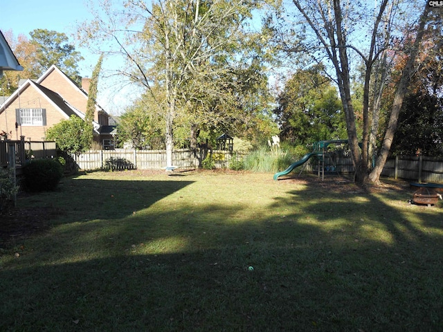 view of yard with a playground