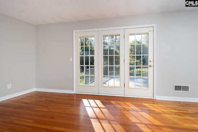 entryway featuring hardwood / wood-style flooring