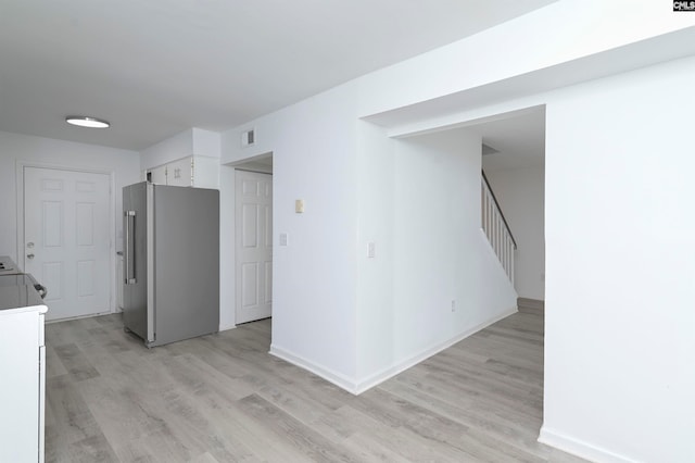 empty room featuring light hardwood / wood-style floors