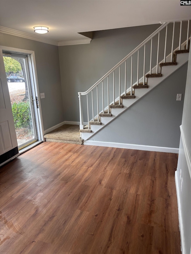 7602 Hunt Club Rd Unit I102, Columbia, SC 29223 - entryway with stairway, wood finished floors, crown molding, and baseboards